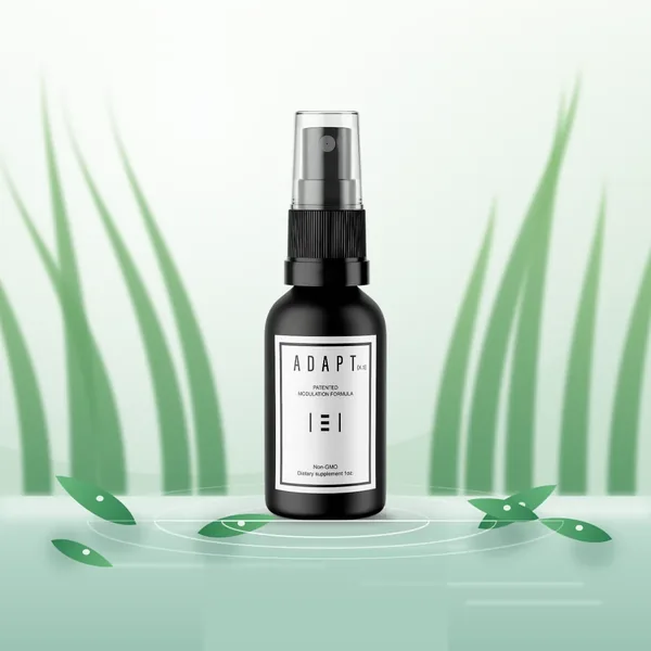 Adapt X.1 bottle among mint leaves on pale green
