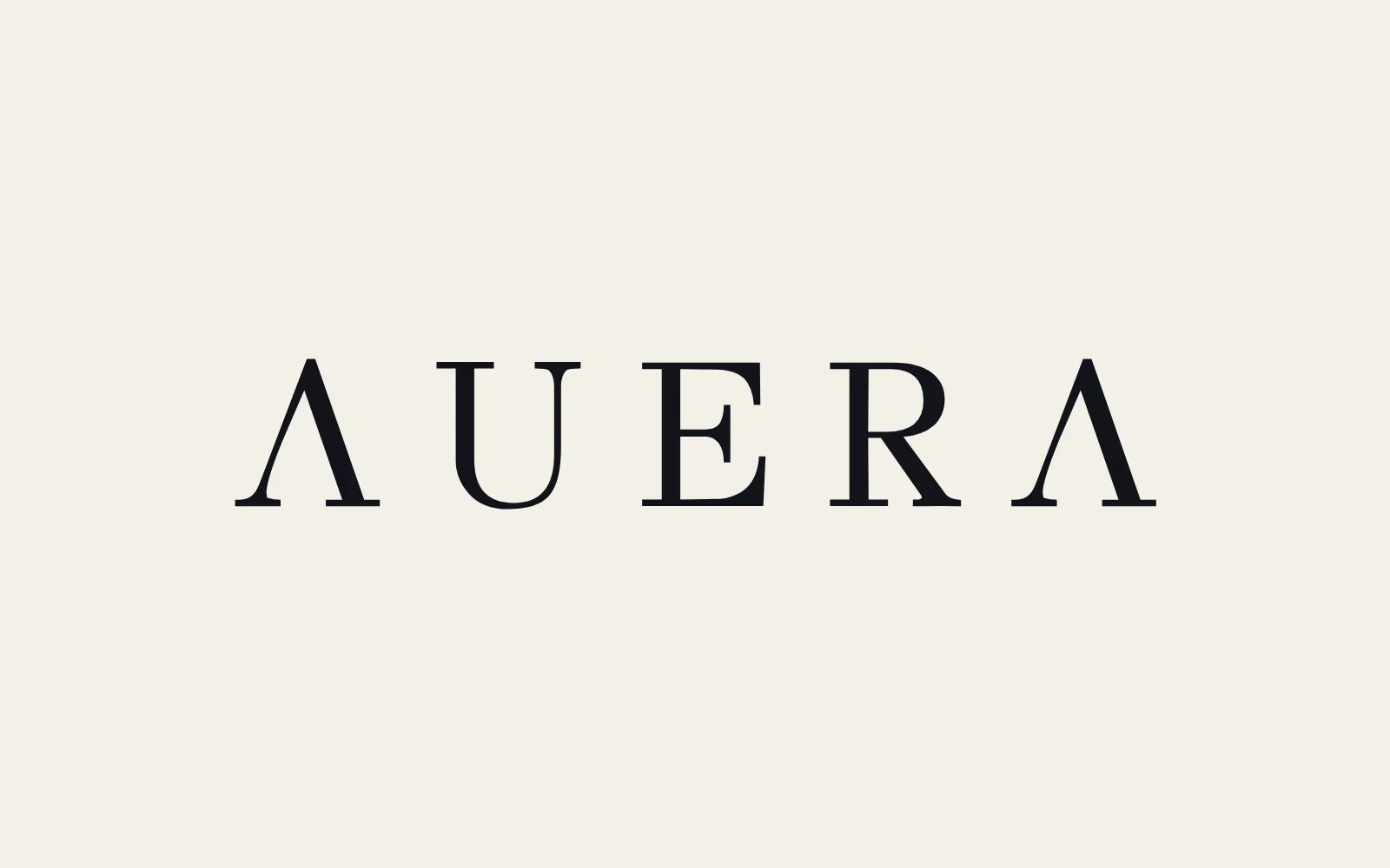 AUERA wordmark in ink on cream